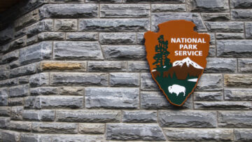 Gatlinburg, Tennessee, USA – May 14, 2017: Insignia for the United States National Park Service on a visitors center in the Great Smoky Mountains National Park.