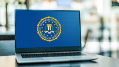 Laptop displaying logo of The Federal Bureau of Investigation