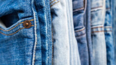 denim blue jeans stack texture background closeup