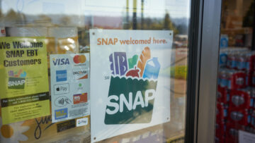 Portland, OR, USA – Oct 28, 2020: “SNAP welcomed here” sign is seen at the entrance to a Big Lots store in Portland, Oregon. The Supplemental Nutrition Assistance Program (SNAP) is a federal program.