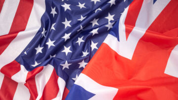 American and UK flag as a background. Top view. International relationship