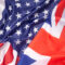 American and UK flag as a background. Top view. International relationship