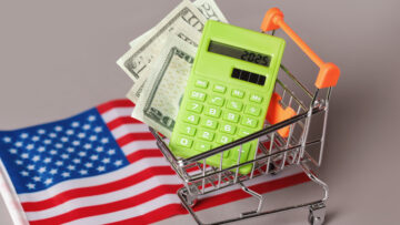 Shopping Cart trolley, Green Calculator, American Flag. Concept Inflation for Grocery Expenses and Consumerism. Cost of Living