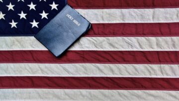 American Flag And Bible. The United States flag and a King James Bible.