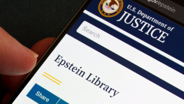 Epstein Library on U.S. Department of Justice justice.gov displayed on smartphone screen with DOJ seal, search field and share button in close-up. Stafford, United Kingdom, February 1, 2026,