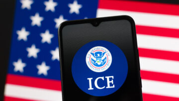 In this photo illustration, the U.S. Immigration and Customs Enforcement’s (ICE) logo is seen displayed on a smartphone screen.