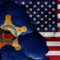 flags of United States Secret Service and USA painted on cracked wall