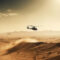 A military chopper flying low over a desert landscape, kicking up a plume of dust, the harsh sun casting long shadows, the rugged terrain stretching out to the horizon