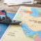 A toy US warship on the map of the Persian Gulf,