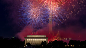 July 4th Independence Day fireworks display over the Washington DC skyline at night.