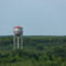 Water Tower Above The Trees