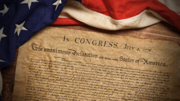 United States Declaration of Independence with a vintage American flag