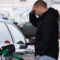 Frustrated Man Refueling Car Worried About High Fuel Prices
