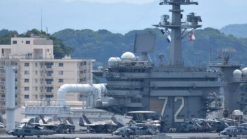 United States Navy USS Abraham Lincoln (CVN-72), Nimitz-class aircraft carrier loaded with aircraft.