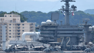 United States Navy USS Abraham Lincoln (CVN-72), Nimitz-class aircraft carrier loaded with aircraft.
