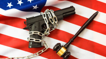 Judges rule on the use of civilian weapons, patriotic flag with pistol.