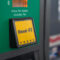 Green diesel fuel button on gas pump at gas station