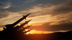 The missiles are aimed at the sky at sunset. Nuclear bomb, chemical weapons, missile defense.
